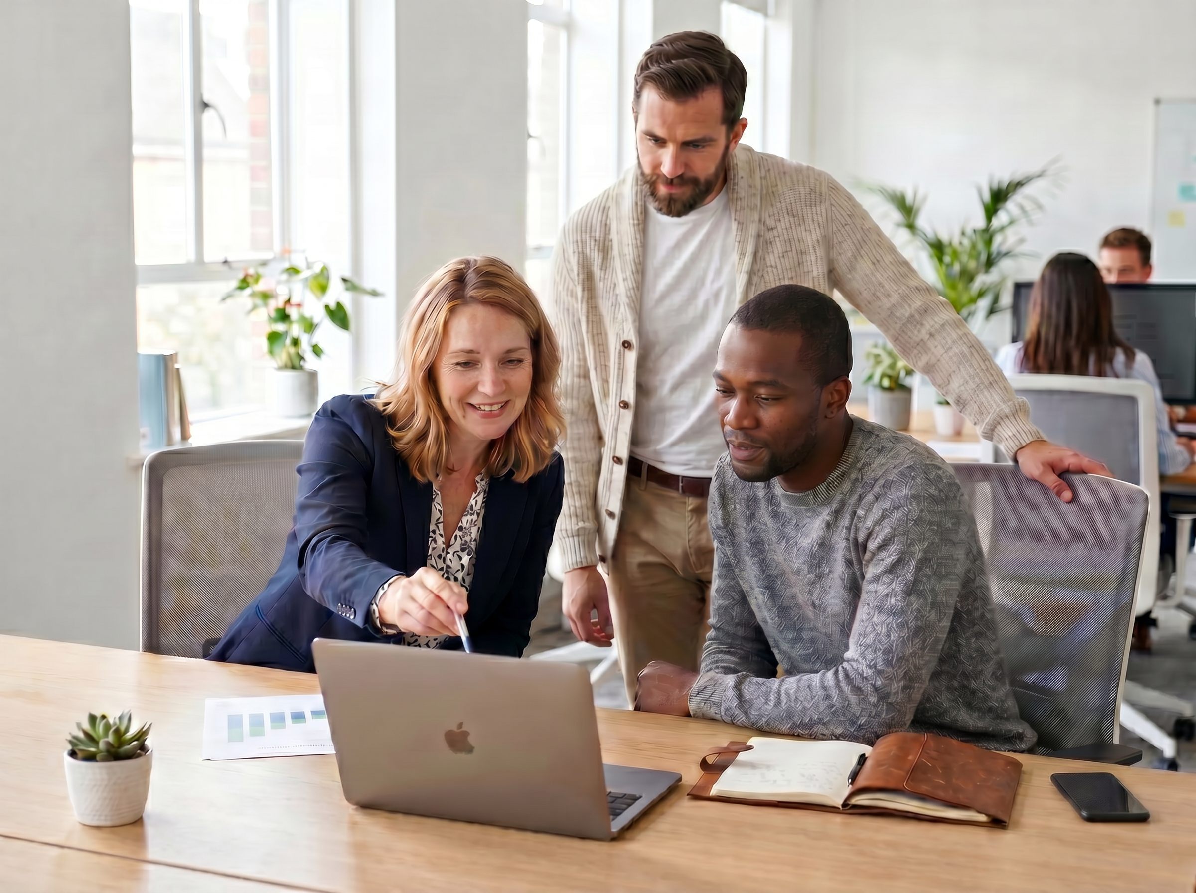 Team collaborating on analytics dashboard